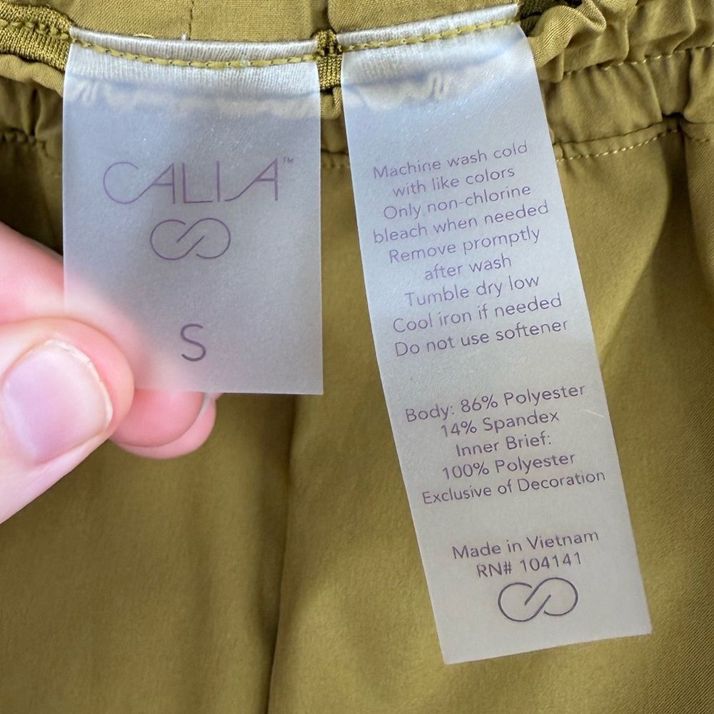 Calia Women's Mid Rise Infinity Run Short in Olive Bronze | Small - Picture 8 of 11